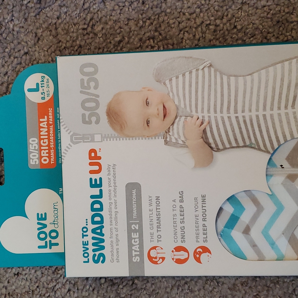 New in box love to swaddle transition swaddle